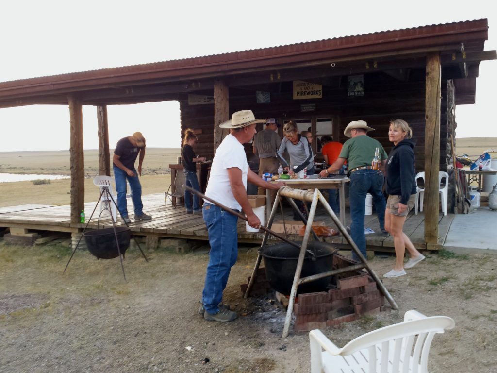 group of people cooking outdoors