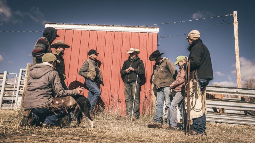 group of cowboys outdoors