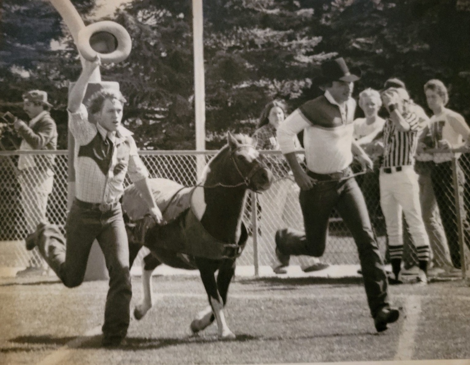 Kids running with pony