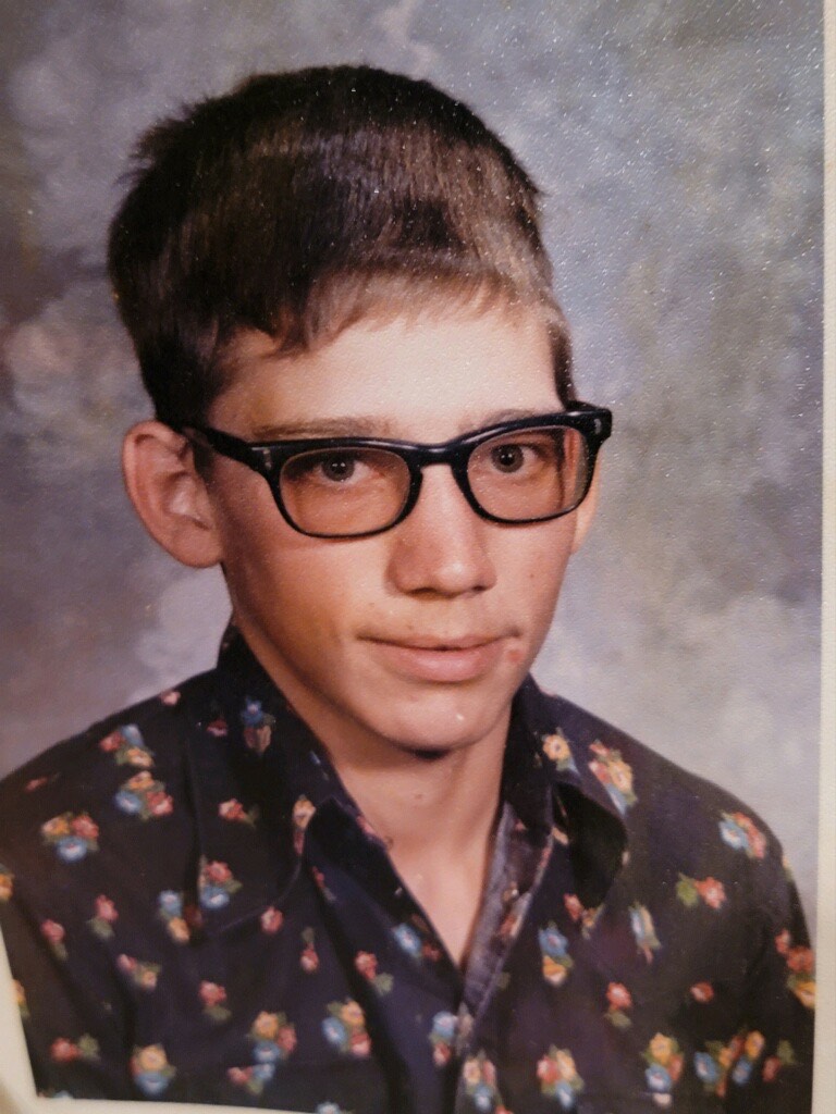 teen with glasses
