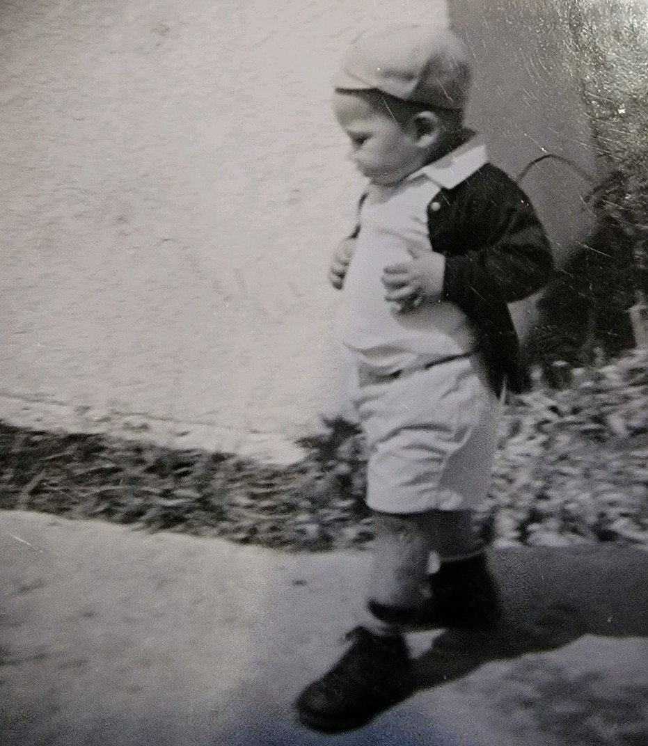 black and white photo of a toddler
