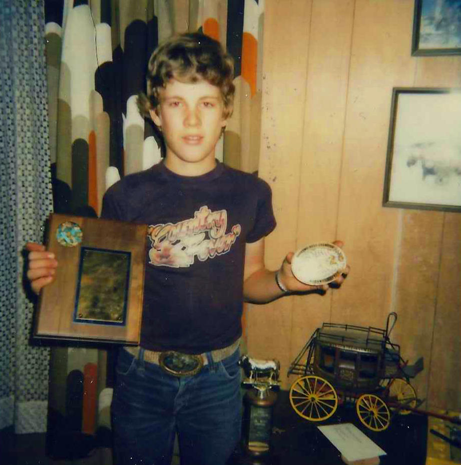 kid with buckle award