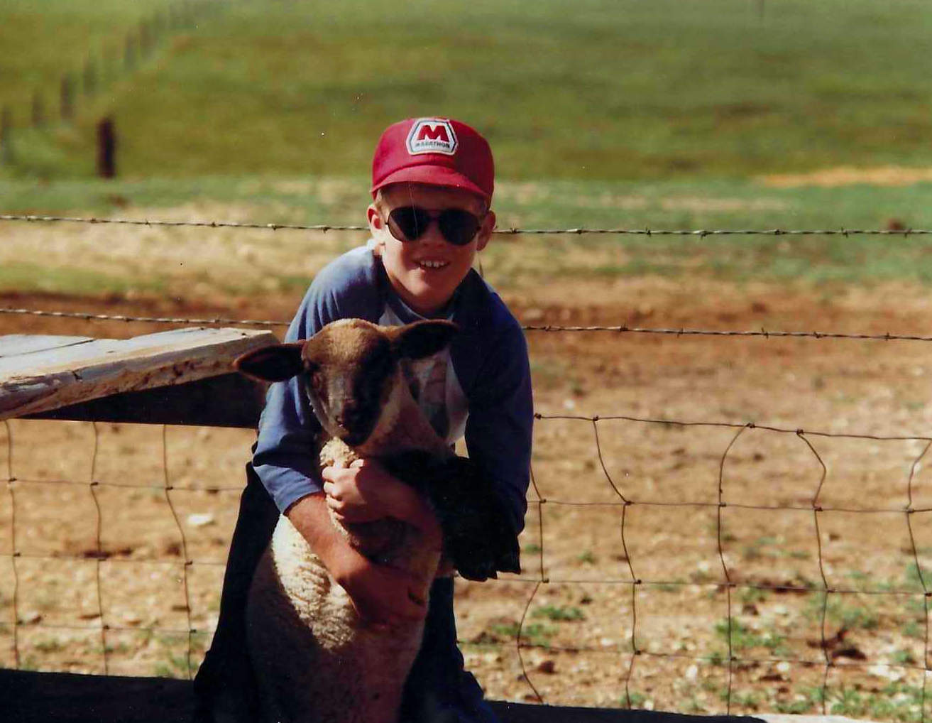 kid with a lamb