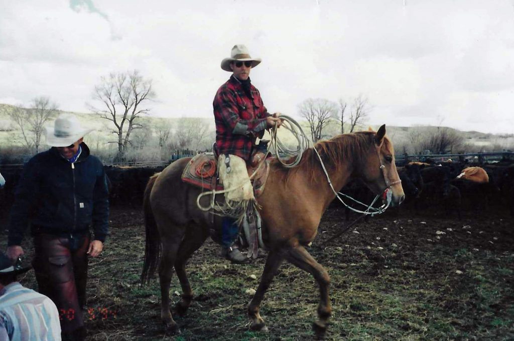 man riding a horse